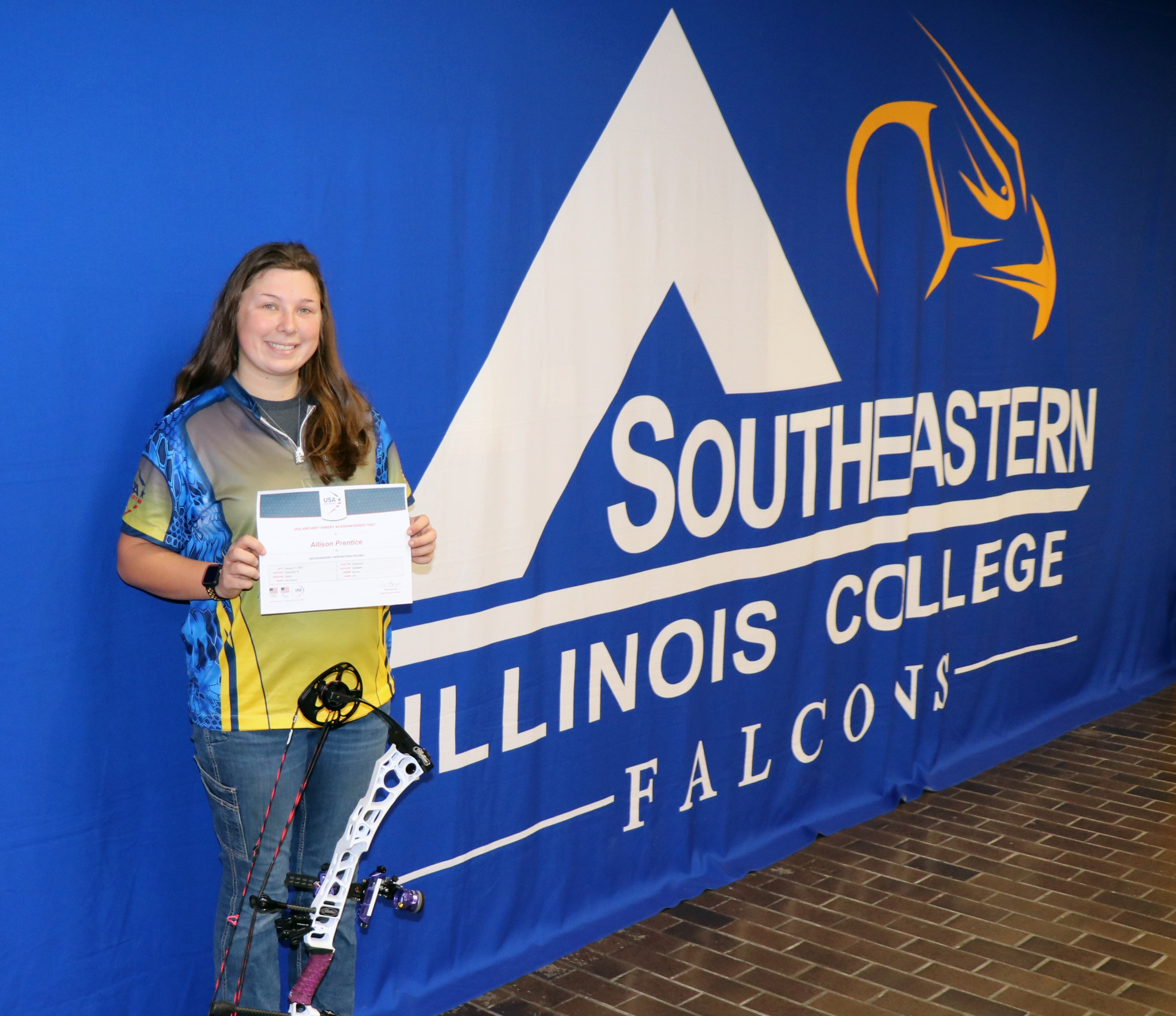 Allie Prentice With Award