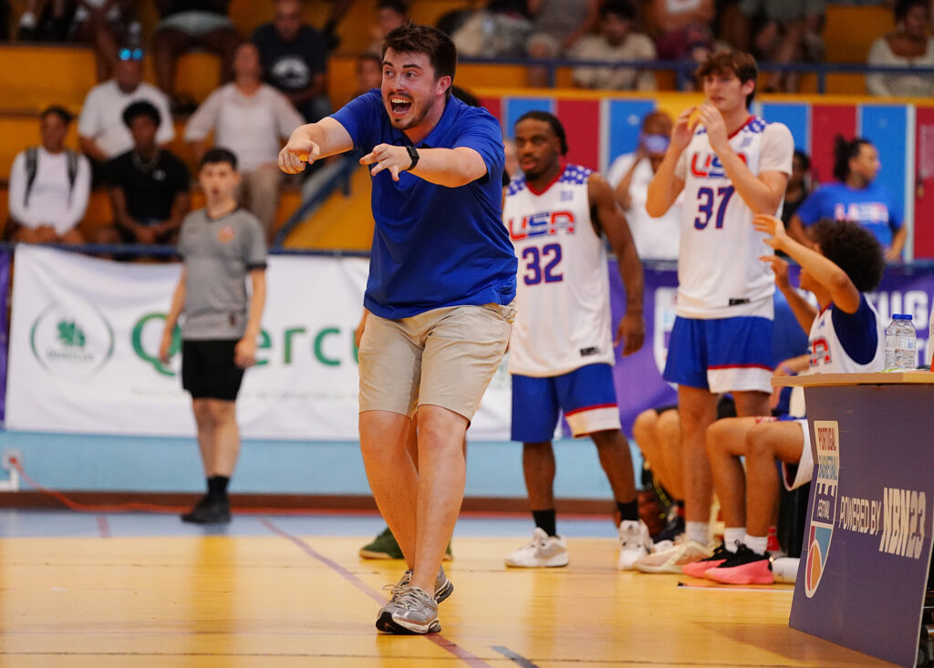 SIC Coach Sam Swinford reacts from the sideline during the Portugal Basketball Festival in Lisbon, where he led the Student Athlete World Tours (SAWUSA) U23 Men’s Basketball Team to a gold medal finish.